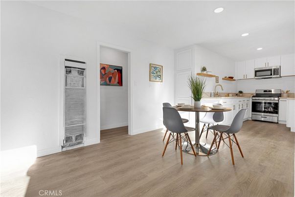 Dining room, Interior, Kitchen, Recessed Lighting, Stainless Steel Appliances, Wood Texture Flooring