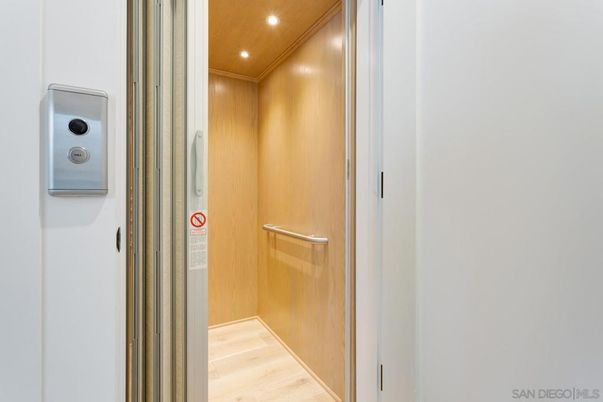 Elevator, Interior, Recessed Lighting, Wooden Ceilings, Wood Texture Flooring, Wooden Walls