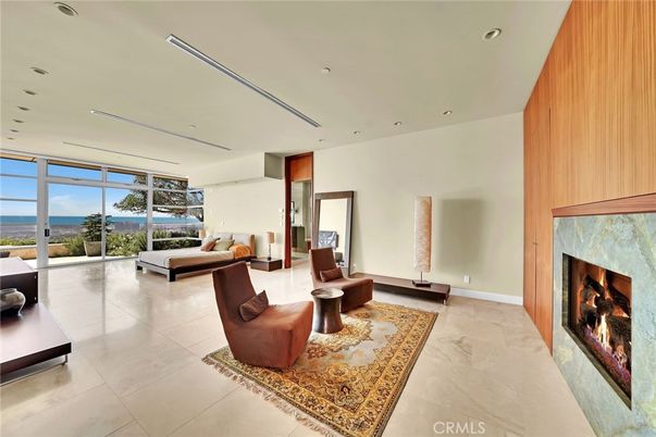 Fireplace, Interior, Living room, Recessed Lighting, Water, Wooden Walls