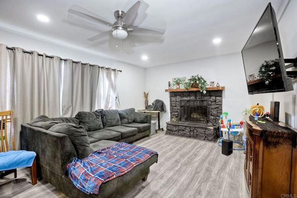 Fireplace, Interior, Living room, Recessed Lighting, Wood Texture Flooring