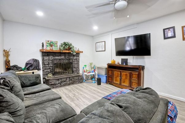 Fireplace, Interior, Living room, Recessed Lighting, Wood Texture Flooring