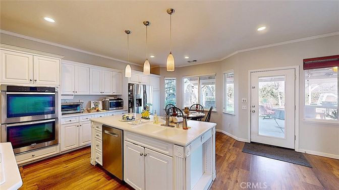 Dining room, Interior, Kitchen, Pendant Lights, Recessed Lighting, Stainless Steel Appliances, Wood Texture Flooring