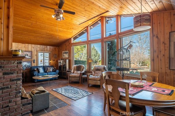 Dining room, Fireplace, Interior, Living room, Pendant Lights, Wooden Ceilings, Wood Texture Flooring, Wooden Walls