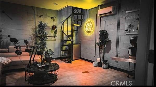 Fitness Equipment, Interior, Recessed Lighting, Stone Walls, Wood Texture Flooring