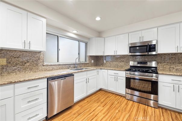 Interior, Kitchen, Recessed Lighting, Stainless Steel Appliances, Wood Texture Flooring