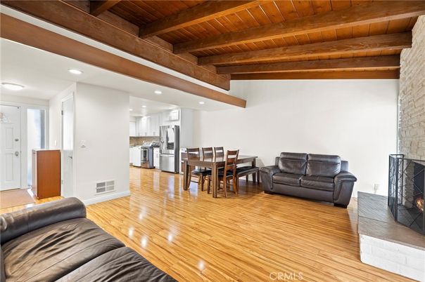 Dining room, Fireplace, Interior, Kitchen, Living room, Recessed Lighting, Stainless Steel Appliances, Stone Walls, Wooden Beams, Wooden Ceilings, Wood Texture Flooring