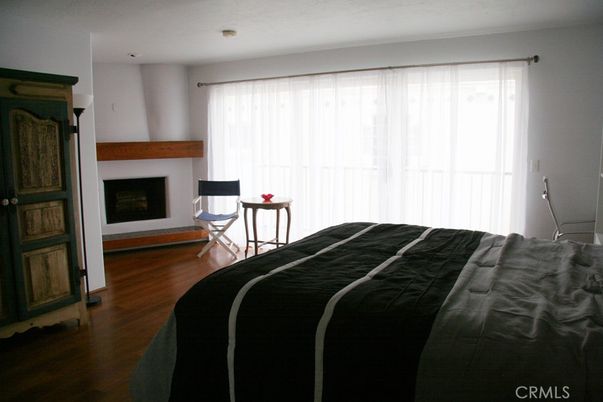 Bedroom, Fireplace, Interior, Recessed Lighting, Wood Texture Flooring