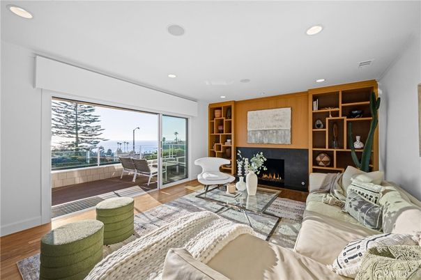 Fireplace, Interior, Living room, Recessed Lighting, Water, Wood Texture Flooring