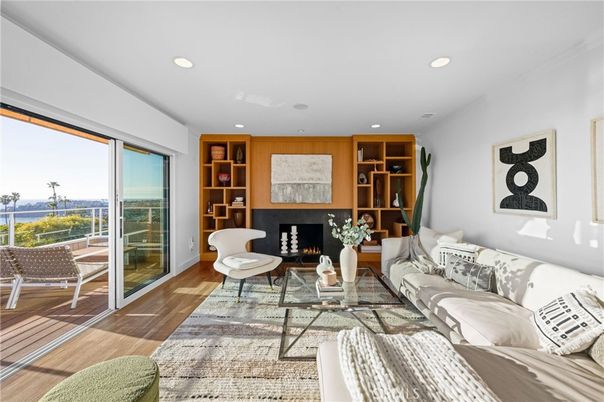 Fireplace, Interior, Living room, Recessed Lighting, Water, Wood Texture Flooring
