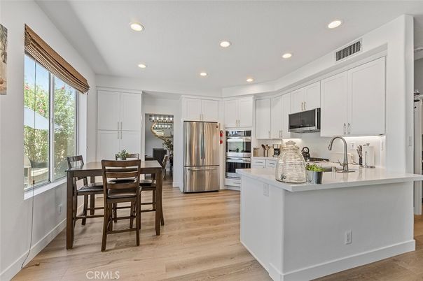 Dining room, Interior, Kitchen, Recessed Lighting, Stainless Steel Appliances, Wood Texture Flooring