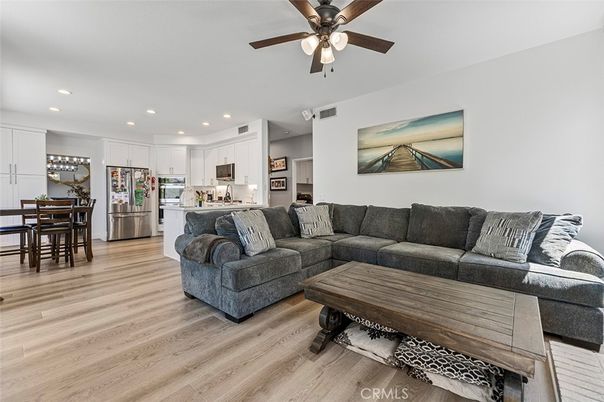 Dining room, Interior, Kitchen, Living room, Recessed Lighting, Stainless Steel Appliances, Wood Texture Flooring
