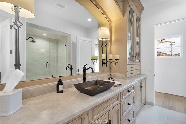 Bathroom, Dual Sink Vanities, Glass Shower, Interior, Recessed Lighting, Tile Countertops, Wood Texture Flooring
