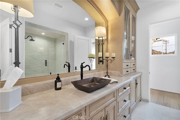 Bathroom, Dual Sink Vanities, Glass Shower, Interior, Recessed Lighting, Tile Countertops, Wood Texture Flooring