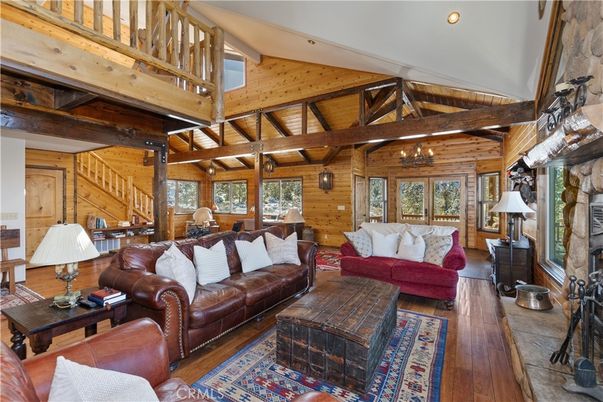 Chandelier, Dining room, Fireplace, Interior, Living room, Recessed Lighting, Wooden Beams, Wooden Ceilings, Wood Texture Flooring, Wooden Walls