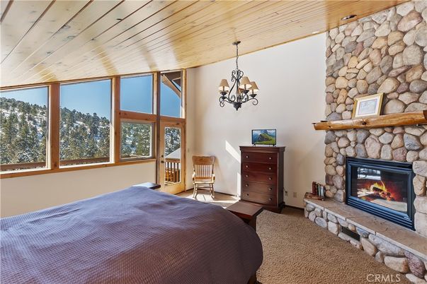 Bedroom, Chandelier, Fireplace, Interior, Stone Walls, Wooden Ceilings