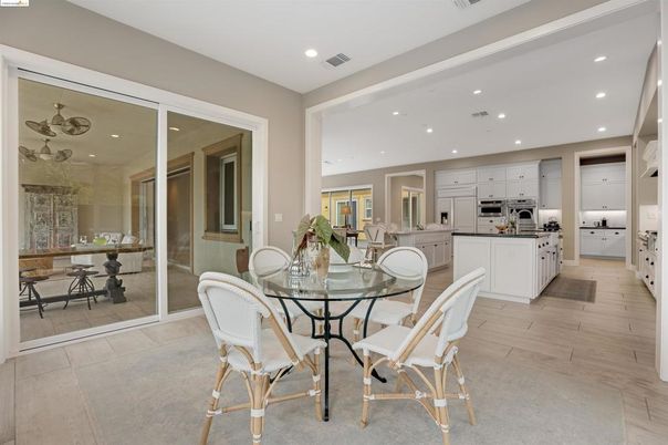 Dining room, Interior, Kitchen, Recessed Lighting, Stainless Steel Appliances, Wood Texture Flooring