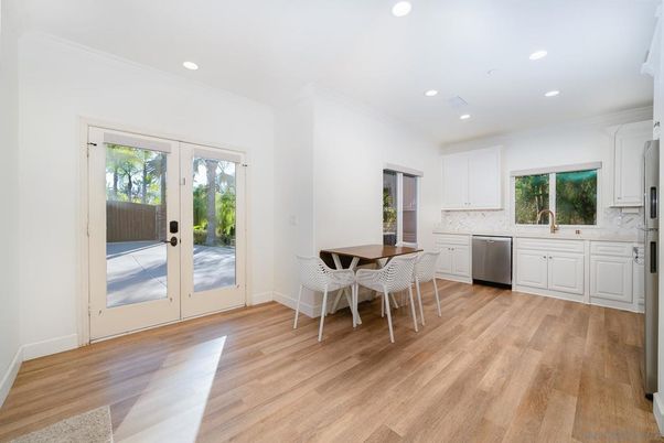 Dining room, Interior, Kitchen, Recessed Lighting, Stainless Steel Appliances, Wood Texture Flooring