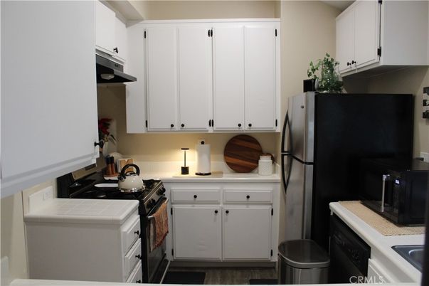 Interior, Kitchen, Tile Countertops, Wood Texture Flooring