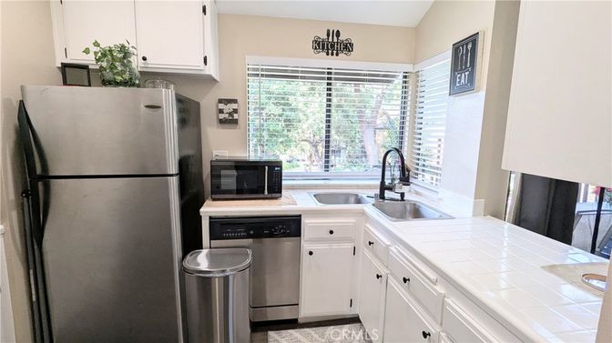 Interior, Kitchen, Stainless Steel Appliances, Tile Countertops