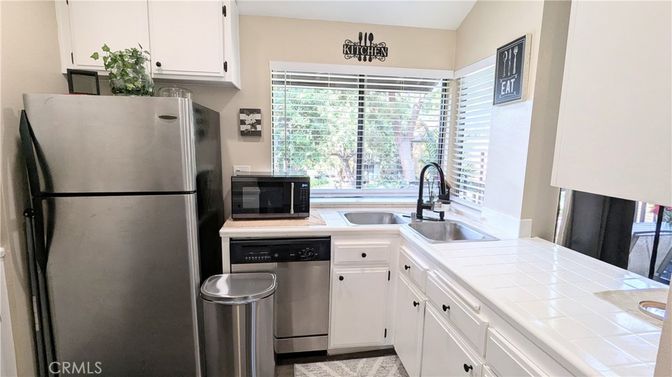 Interior, Kitchen, Stainless Steel Appliances, Tile Countertops
