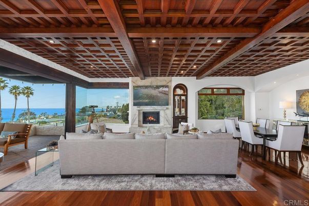 Dining room, Fireplace, Interior, Living room, Recessed Lighting, Water, Wooden Beams, Wooden Ceilings, Wood Texture Flooring