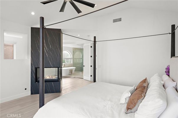 Bedroom, Fireplace, Interior, Recessed Lighting, Wood Texture Flooring