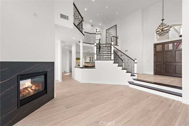 Fireplace, Interior, Pendant Lights, Recessed Lighting, Wood Texture Flooring