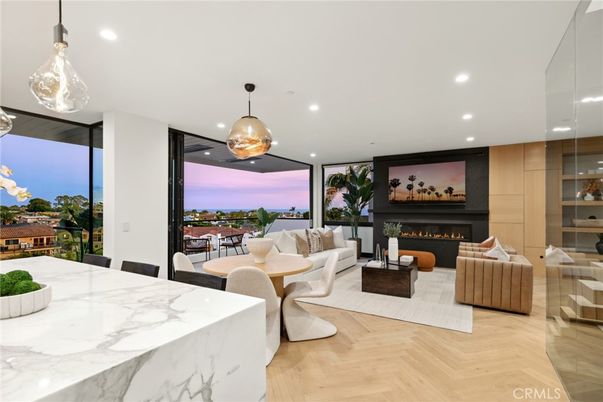 Dining room, Fireplace, Interior, Living room, Pendant Lights, Recessed Lighting, Wood Texture Flooring