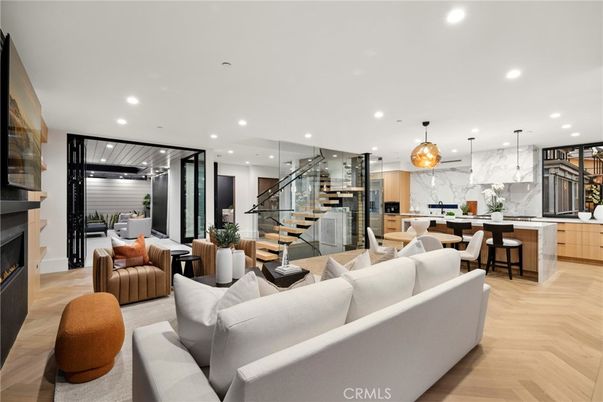 Dining room, Fireplace, Interior, Kitchen, Living room, Marble Walls, Pendant Lights, Recessed Lighting, Wood Texture Flooring