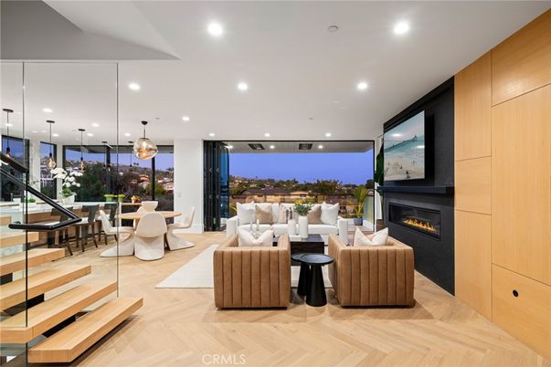Dining room, Fireplace, Interior, Living room, Pendant Lights, Recessed Lighting, Wood Texture Flooring, Wooden Walls