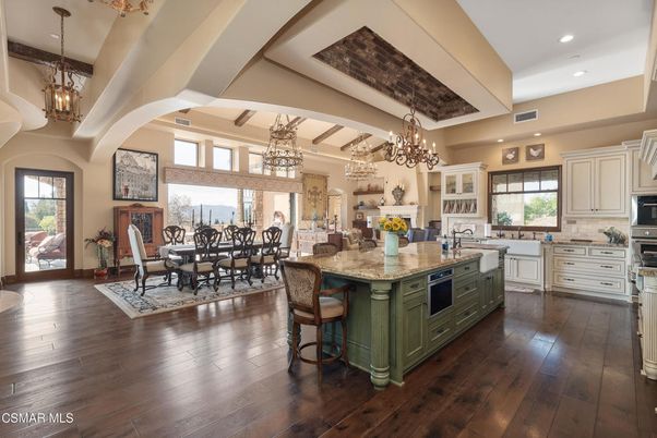Chandelier, Dining room, Interior, Kitchen, Pendant Lights, Recessed Lighting, Stainless Steel Appliances, Wooden Beams, Wood Texture Flooring