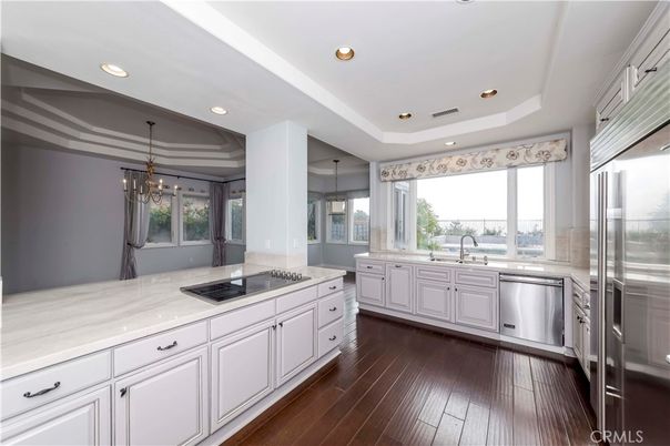 Chandelier, Interior, Kitchen, Recessed Lighting, Stainless Steel Appliances, Wood Texture Flooring
