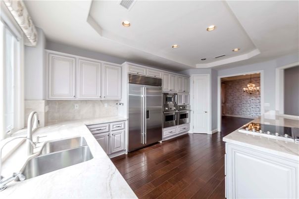 Chandelier, Interior, Kitchen, Recessed Lighting, Stainless Steel Appliances, Wood Texture Flooring