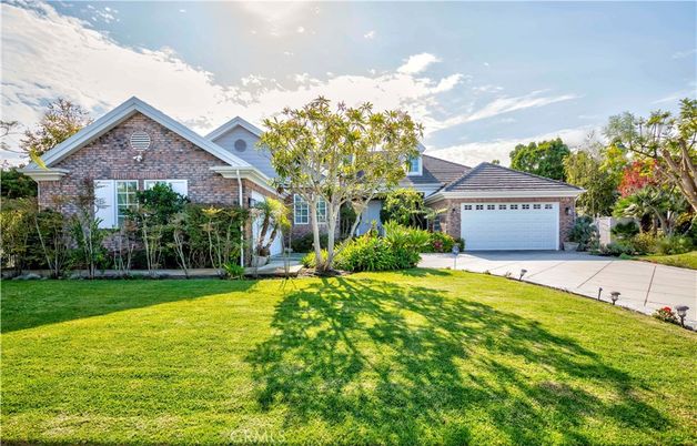 Attached, Backyard, Exterior, Facade, Brick Facade, Brick Traditional