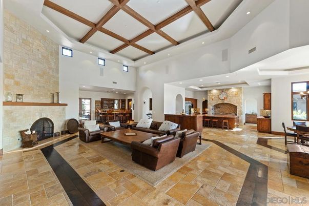 Dining room, Fireplace, Interior, Living room, Recessed Lighting, Stone Walls, Wooden Beams