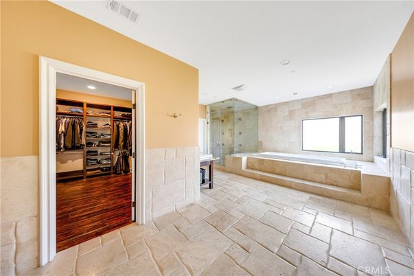 Bathroom, Glass Shower, Interior, Recessed Lighting, Walk-in Closets, Wood Texture Flooring