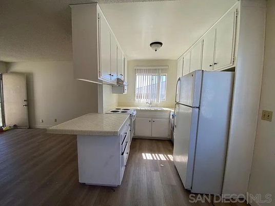 Interior, Kitchen, Tile Countertops, Wood Texture Flooring