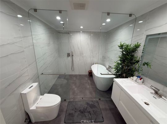 Bathroom, Free Standing Baths, Glass Shower, Interior, Marble Walls, Recessed Lighting