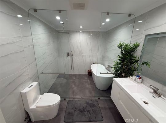 Bathroom, Free Standing Baths, Glass Shower, Interior, Marble Walls, Recessed Lighting