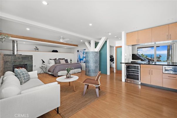 Fireplace, Interior, Living room, Recessed Lighting, Water, Wood Texture Flooring