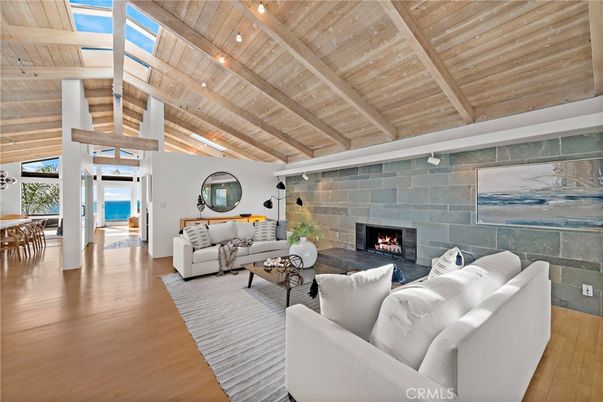 Dining room, Fireplace, Interior, Living room, Recessed Lighting, Stone Walls, Wooden Beams, Wooden Ceilings, Wood Texture Flooring