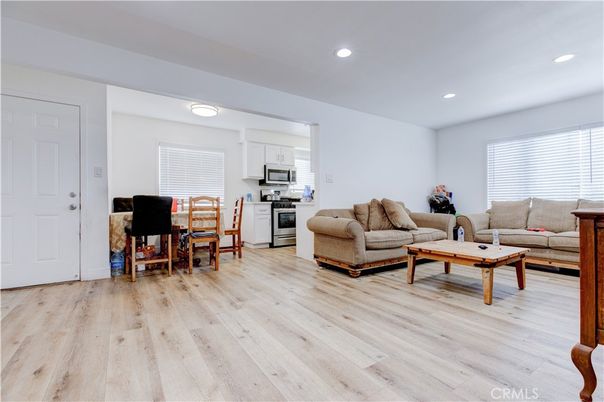Dining room, Interior, Kitchen, Living room, Recessed Lighting, Stainless Steel Appliances, Wood Texture Flooring