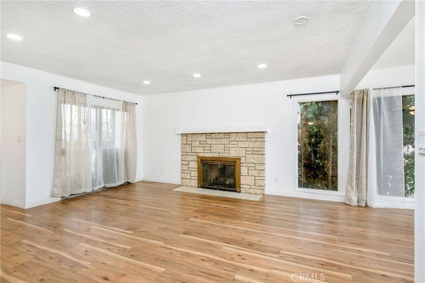 Empty room, Fireplace, Interior, Recessed Lighting, Wood Texture Flooring