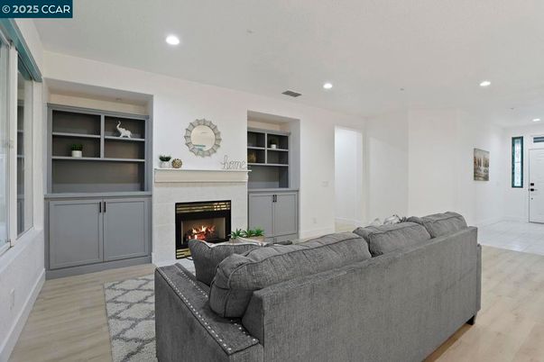 Fireplace, Interior, Living room, Recessed Lighting, Wood Texture Flooring