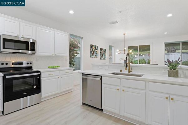 Interior, Kitchen, Pendant Lights, Recessed Lighting, Stainless Steel Appliances, Wood Texture Flooring