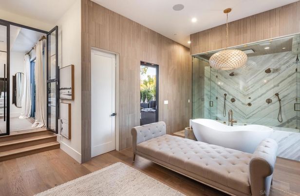 Bathroom, Free Standing Baths, Glass Shower, Interior, Recessed Lighting, Wood Texture Flooring, Wooden Walls