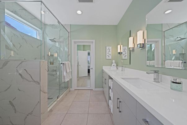 Bathroom, Dual Sink Vanities, Glass Shower, Interior, Marble Walls, Recessed Lighting