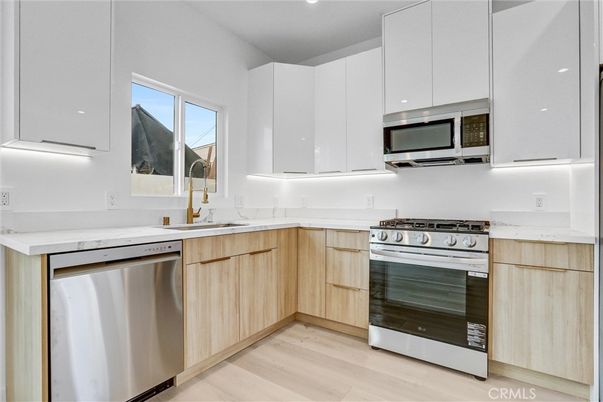 Interior, Kitchen, Recessed Lighting, Stainless Steel Appliances, Wood Texture Flooring