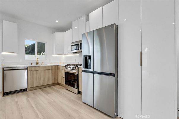 Interior, Kitchen, Recessed Lighting, Stainless Steel Appliances, Wood Texture Flooring
