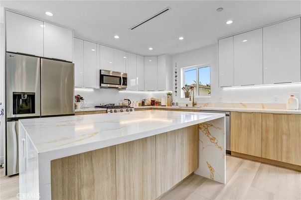 Interior, Kitchen, Recessed Lighting, Stainless Steel Appliances, Wood Texture Flooring